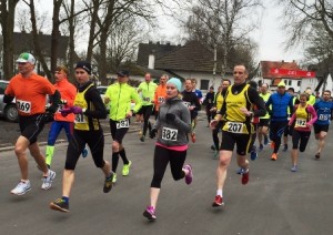 Anja Quincke, Stephan Menke und Juliane Ilgert im gelben Trikot des MCM